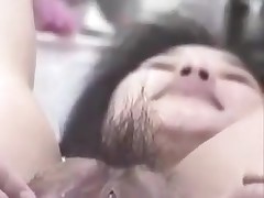 Korean slut with big pussy and pouty lips gets naughty on camera. That babe stuffs her hairy pussy with fingers, metal balls and even a bottle. This cunt can swallow a lot of jizz too!